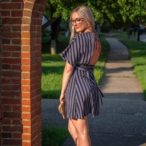 Plunging vneck and open back stripes dress